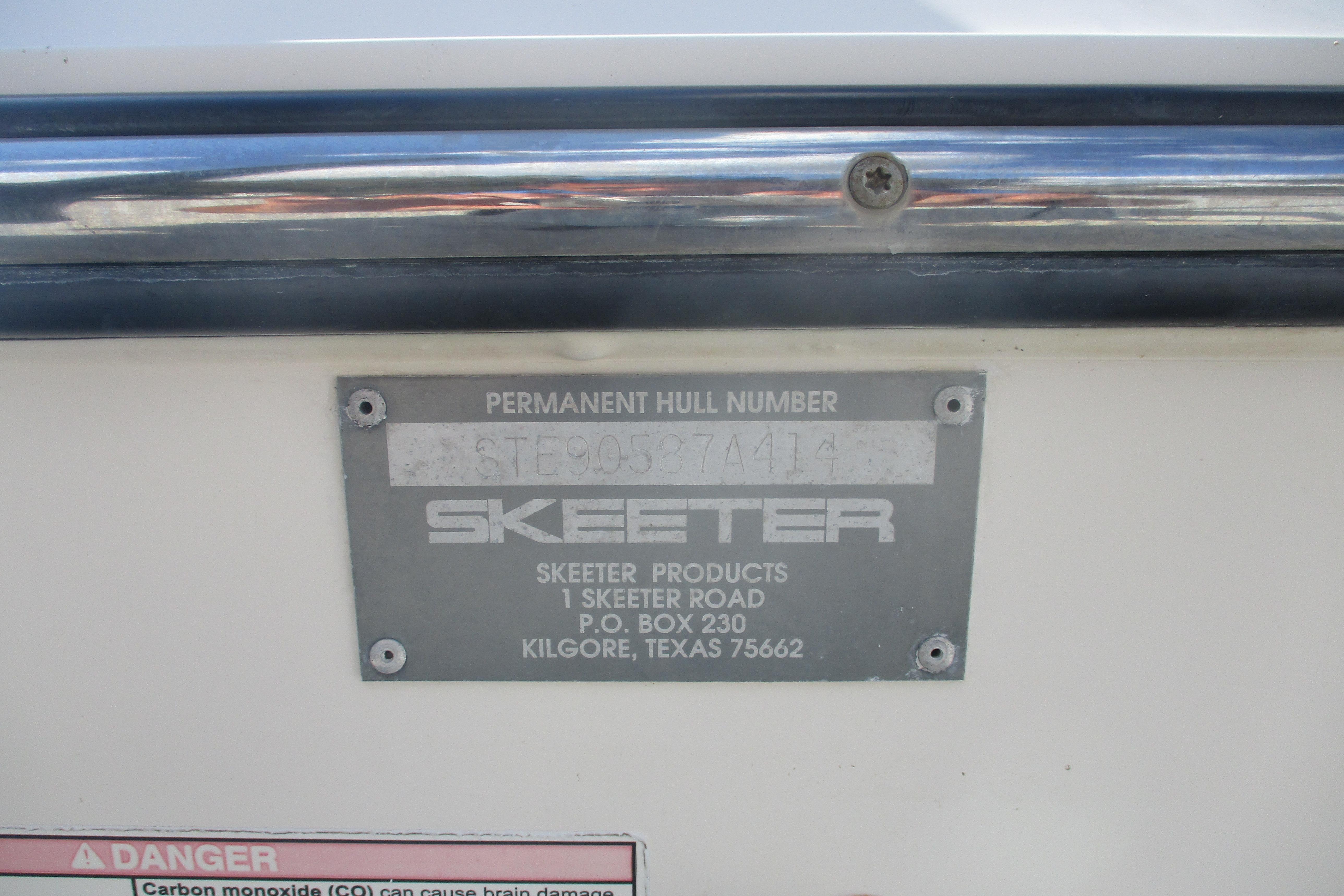 2014 Skeeter SX240 hull identification plate with manufacturer details.
