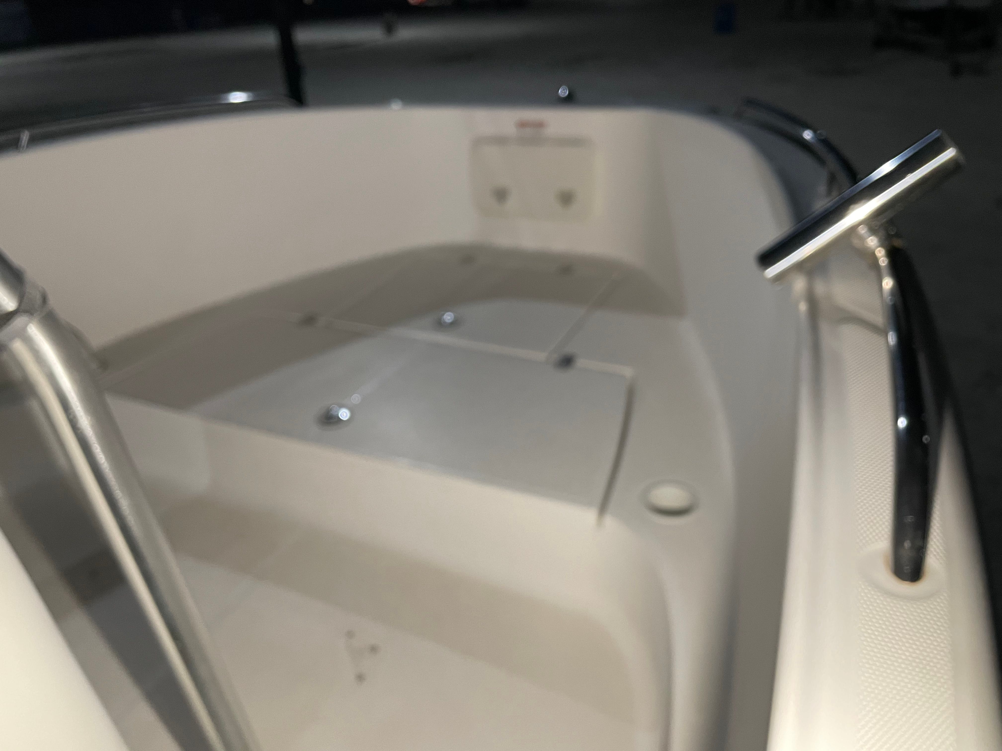 Interior view of a 2005 Aquasport 210 Osprey boat.